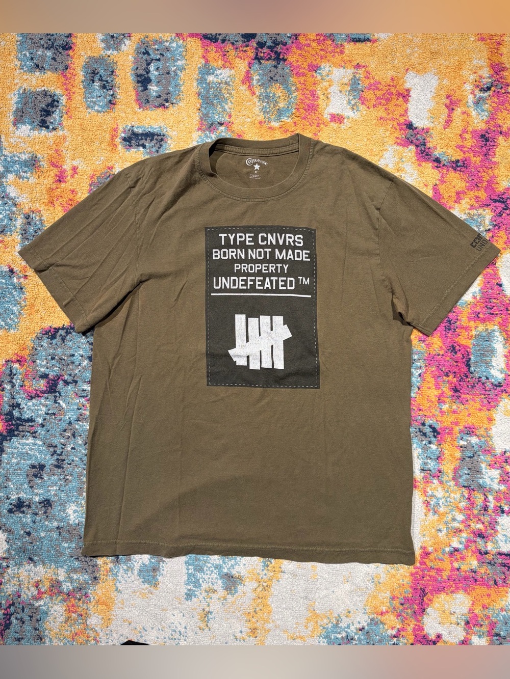 Undefeated x Converse shirt